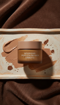 Nourishing Post-Color Mask, Hero angle: 45-degree (3/4) close-up showcasing packaging and color product with tactile...